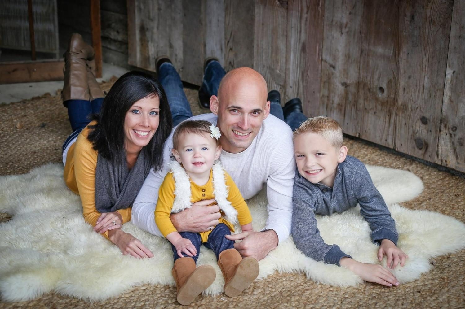 Matt Weis with his wife and children.