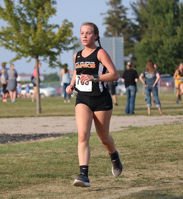 During the Cross Country meet at Starmont, Maddy Gray (11), runs towards the finish line.