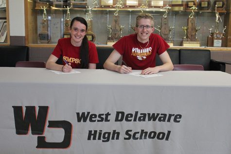 Seniors Abby Loecke and Cole Engel sign to run track and field in college.