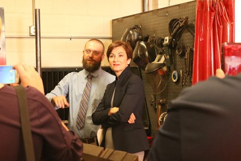 Welding teacher Seth Harms shows Governor Kim Reynolds the welding lab at West Delaware High School.