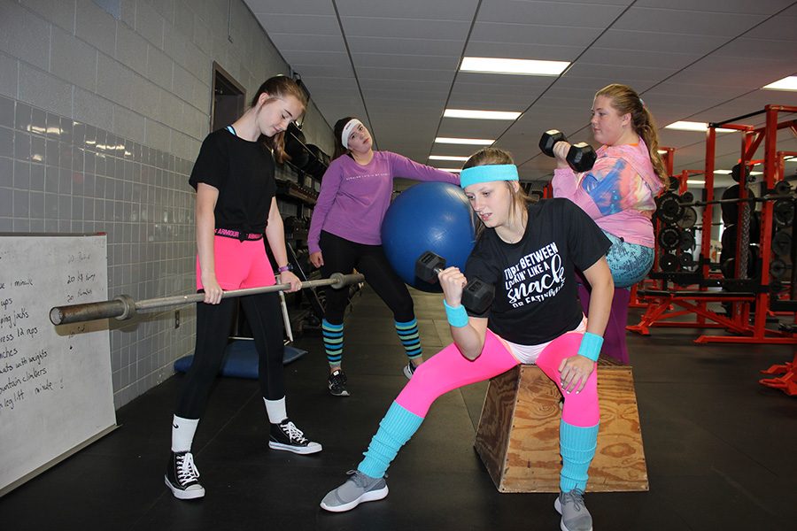 On Workout Wednesday, students were encouraged to wear their favorite workout attire. From left to right: Katie McGrane (10), Sheeley McMahon (10), Hailey Hellman (11), Victoria Harris (11).
