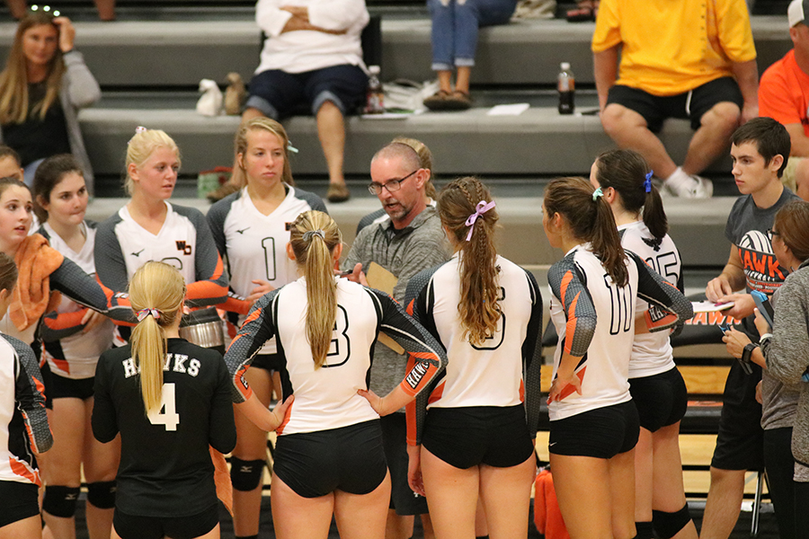 West Delaware’s volleyball team takes a time-out while playing Mount Vernon. Top Row: Paighton Lindauer (12), Megan McDonald (12), Leah Wegmann (11), Carlee Smith (9), Coach Brett Mather; Bottom Row: Ella Koloc (9), JoAnna Voss (12), Macey Kleitsch (11), Kinley Kolbet (11), Allison Collier (11), Devon Gardener (12), Coach Shea Putz.