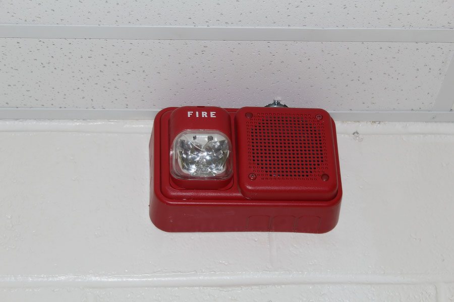 The fire alarm that detected the smoke from the classroom.