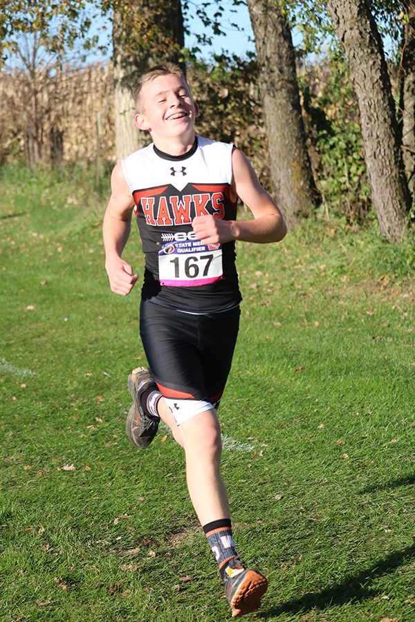 At the state qualifier meet, Tyger Vaske (10) beats his personal record with a time of 19:13 on Oct. 18.