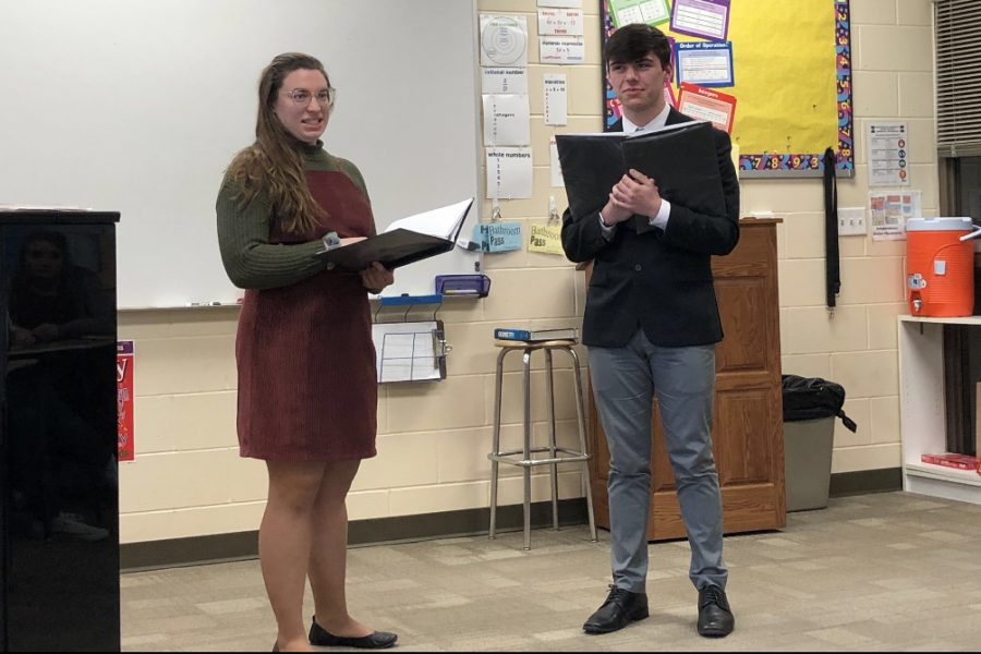 Seniors Justin Grawe and Olivia Neuzil perform a duet at the Solo and Ensemble Competition. 