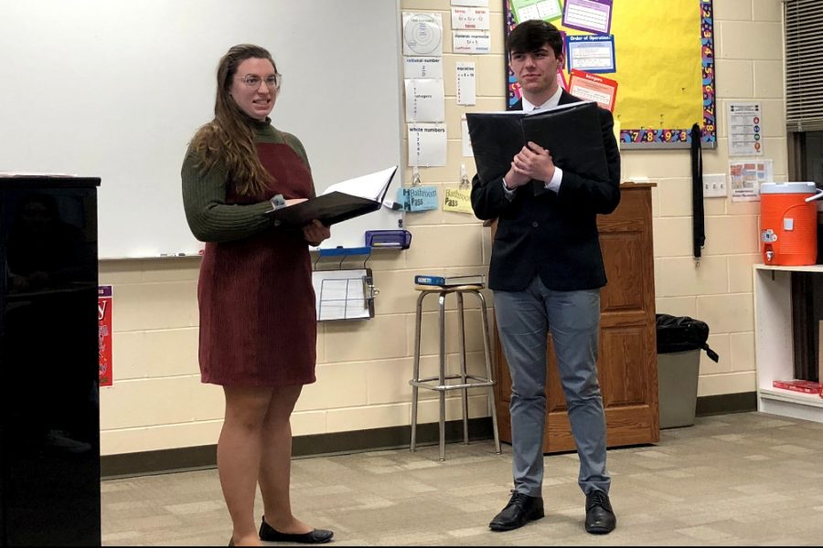 Seniors Olivia Neuzil and Justin Grawe perform a duet at the Solo and Ensemble competition held at Independence high School. 
