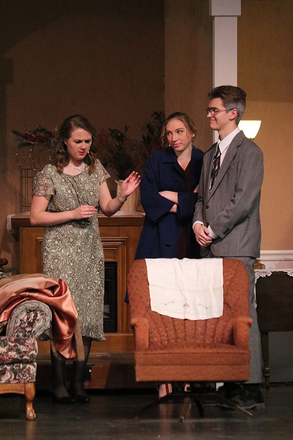 In a family meeting, Taylor Hammer (10), Mikayla Neuzil (10) and Tyler Salow (12) act as Daisy, June, and Ernest Stanley, respectively. The familys life is interrupted when radio host Sheridan Whiteside breaks his hip on their doorstep. 