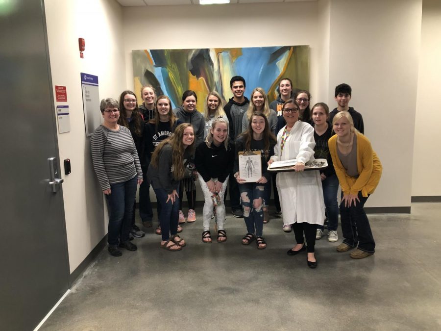 Student posed for a picture inside the new science building at Cornell College. Front Row: Darla Gaskill, Macie Funke, Madelyn Gray, Lacey Cole, Shea Putz, Alexis Scott, Chloe Thein; Back Row: Kamille Hawker, Macy Loecke, Amber Cook, Kennedy Niles, Hayley Cook, Nathan Bishop, Alexis Eike, Paighton Lindauer, Annika Sutter, Matthew Salas. 