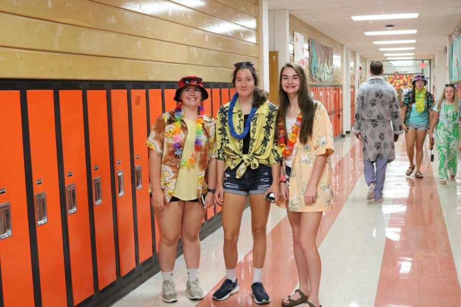 Sophomores Rachel Wenger, Jaci Bries and Emily Prier don their vibrant leis on Hawaiian Day.