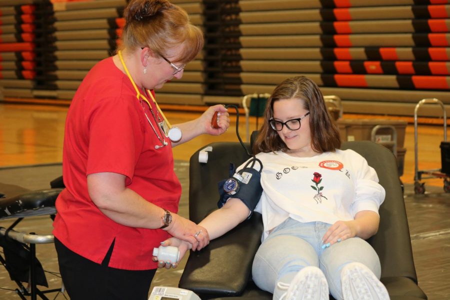 Isabella Maule(12) donates blood at the 2018 Blood Drive. 