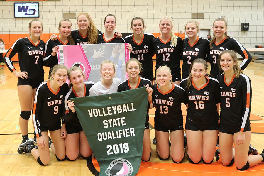 The West Delaware Hawks celebrate their win over the Comets in last nights Regional Final volleyball match. The Hawks won, 25-12, 25-16, 25-10.