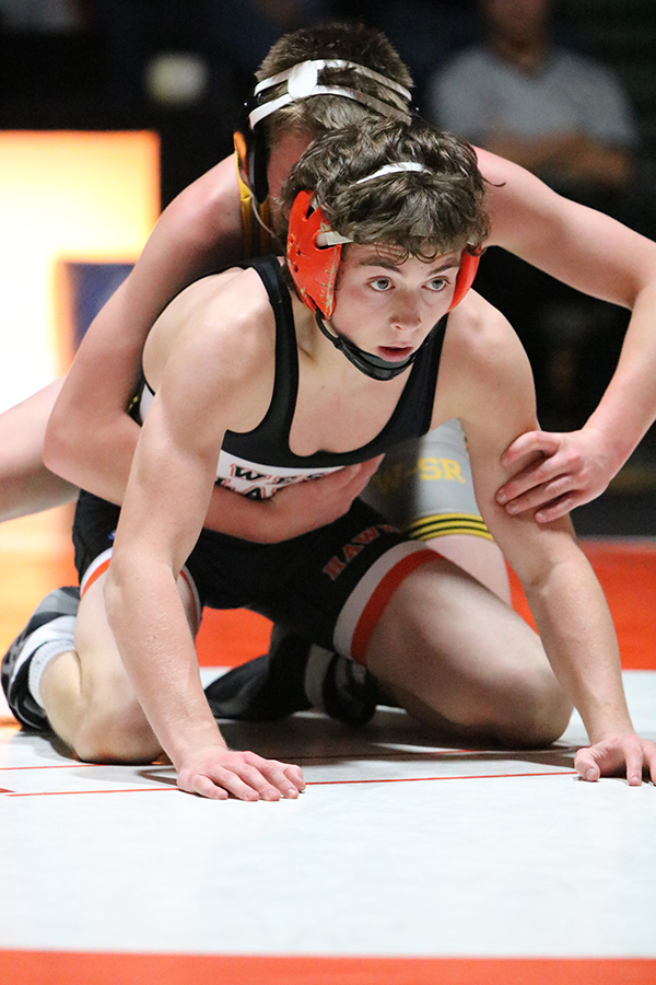 In the 126-pound weight class, senior Evan Woods wins by fall over Waverly-Shell Rocks Cael Holmgren.