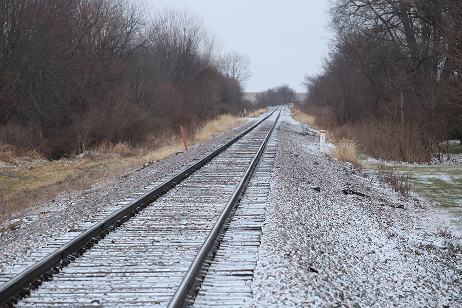 A slight layer of fresh snow rests on a railroad. While Manchester is located far from the North Pole, Christmas cheer is still found at West Delaware.