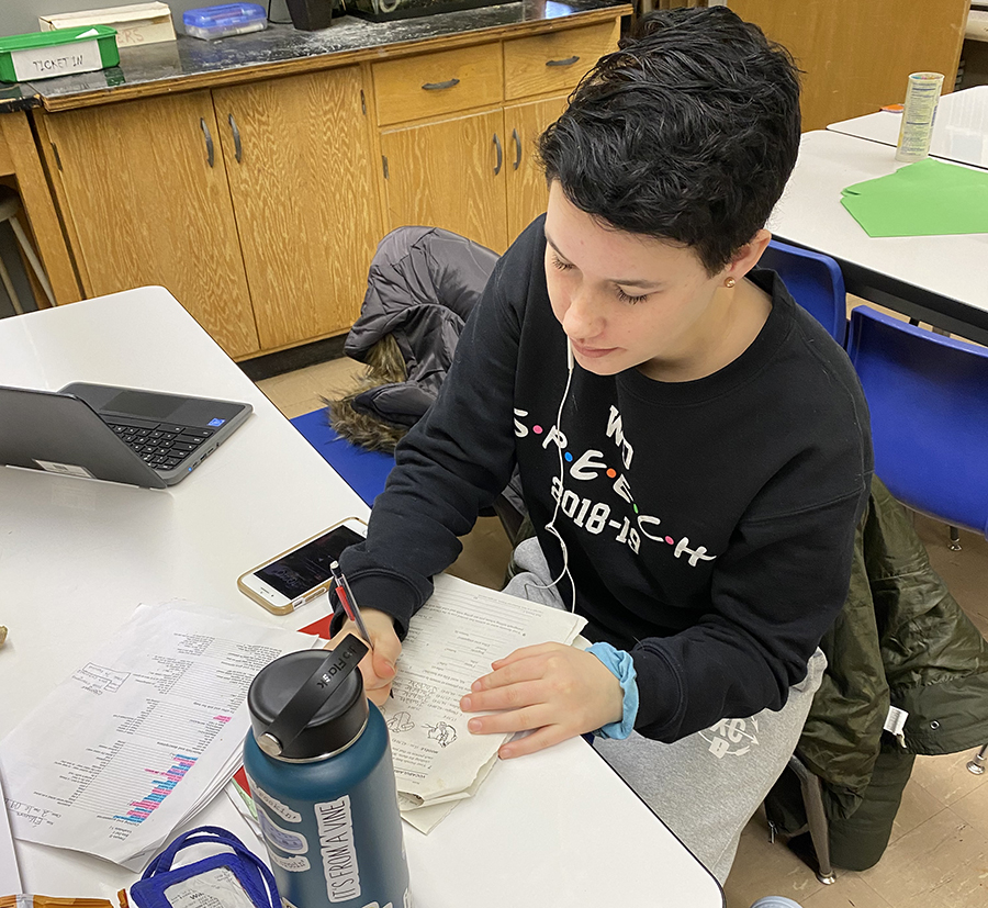 Gracie Weeks (12) uses the extra time during homeroom to catch up on French. Weeks is a very involved student while also taking complicated classes that require extra work.