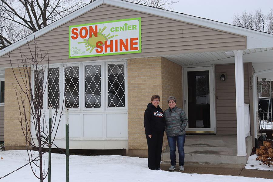 Darla Weber and Darla Gaskill stand outside of the Sonshine Center.