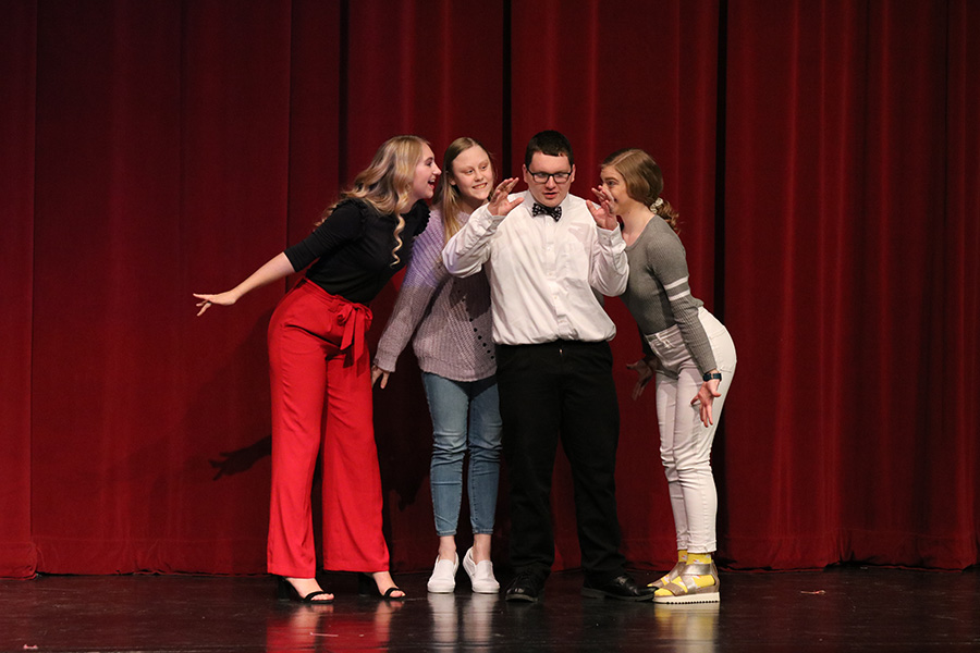 Performing in Group Improv Camryn Borchardt (11), Chloe Bahls (10) and Addison Reetz (11) wrap around Laiken Blommers (11). 