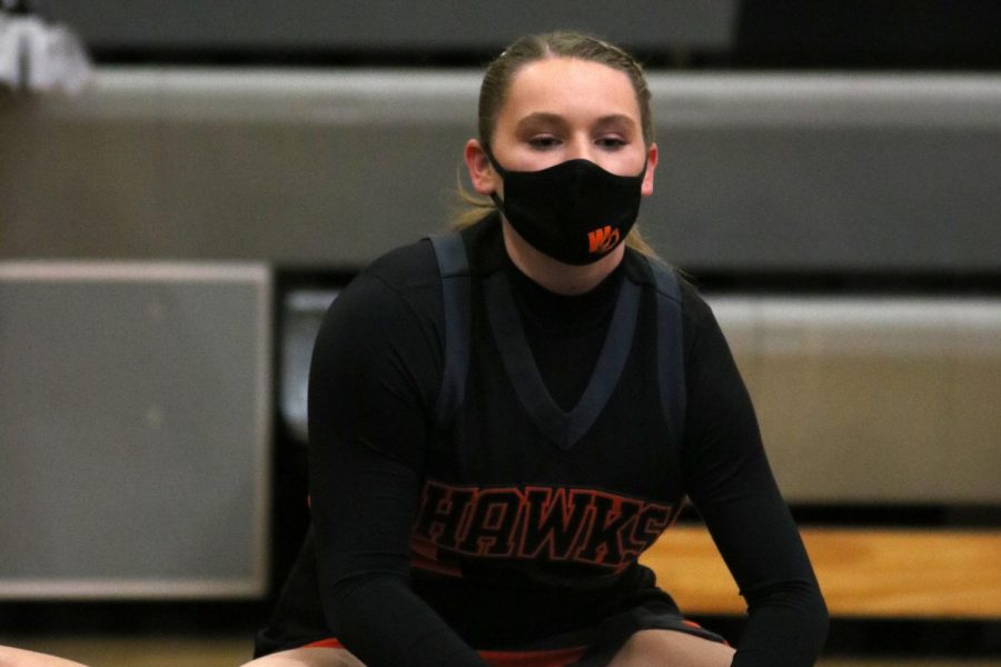 Blommers cheers on the Hawks while competing against Mount Vernon.