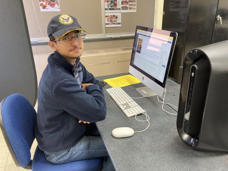 During his Journalism class, foreign exchange student Prottay Roy Chowdhury (11) looks at the camera in the computer lab.