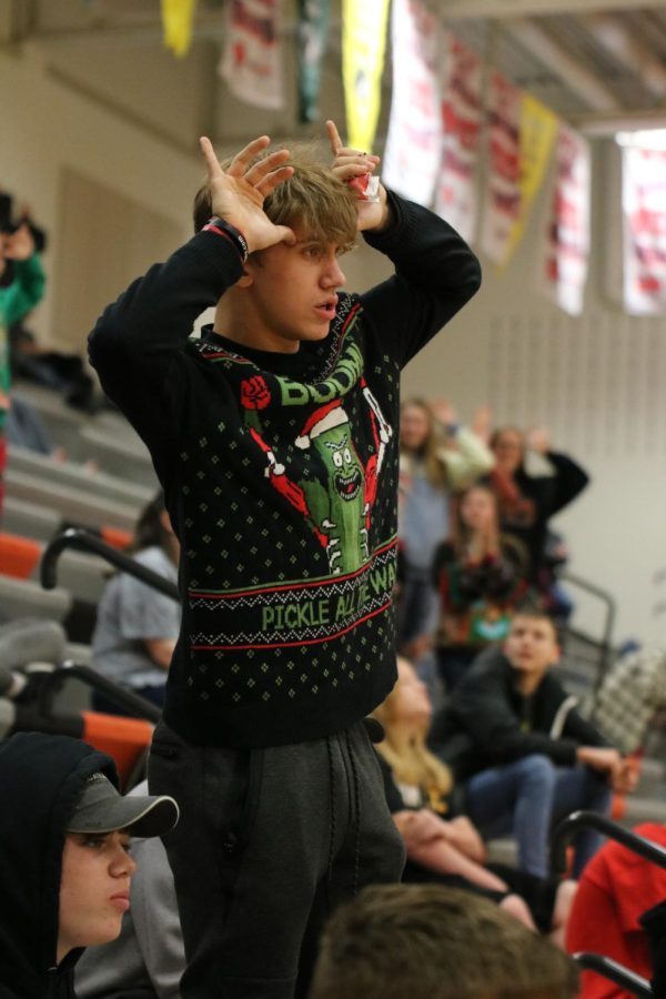 During the game of Santa and Reindeer in Seedorff Gym, Micheal Kephart (9) mimics a reindeer.