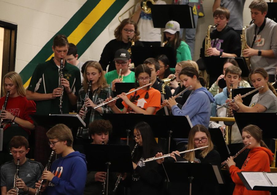 West Delaware and Beckman pep band members play together on Dec. 17.