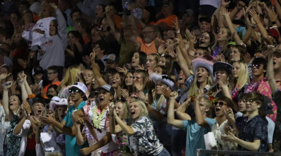 After a Will Ward (12) touchdown, West Delaware students erupt. The theme was beach night.