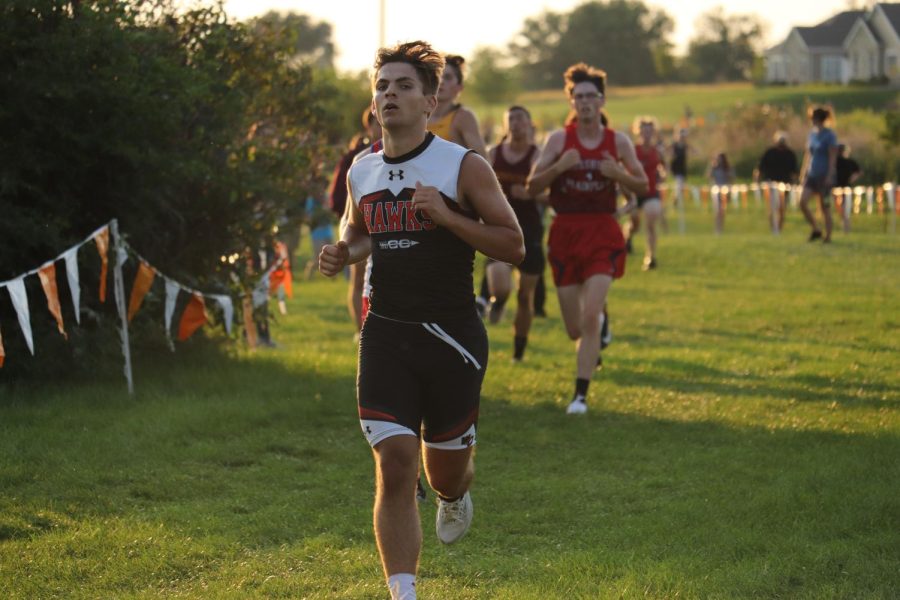 Hitting race pace, Ethan Grawe (11) drives down the middle of the course. 