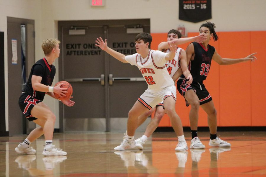 While on defense, Griffin Lott (10) guards his man.