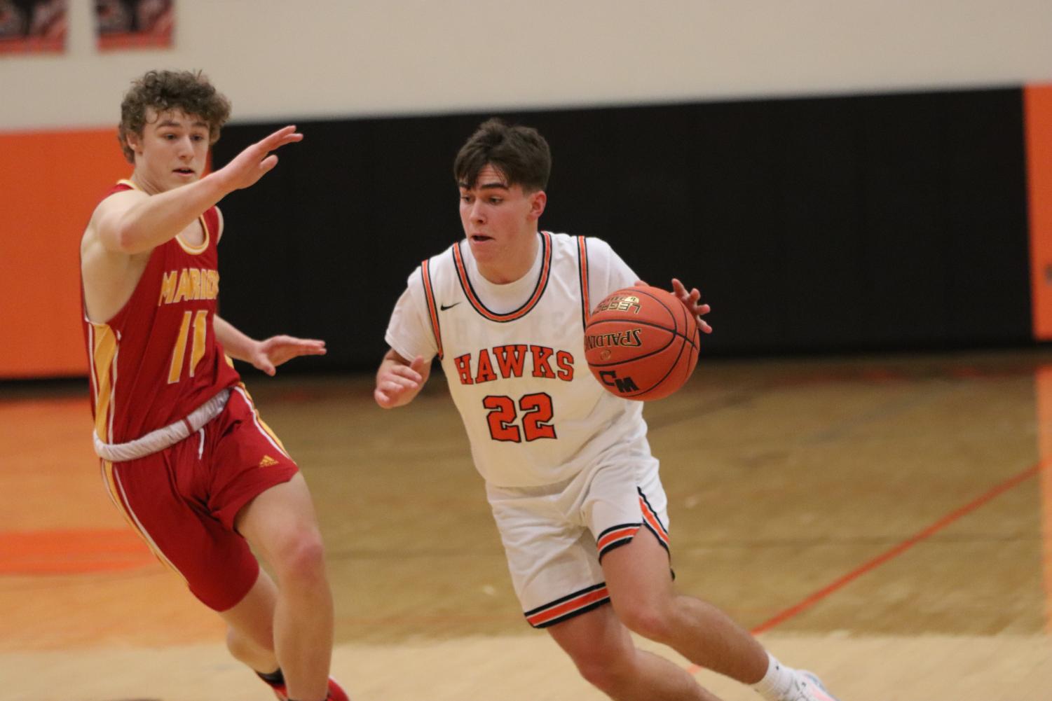 Boys Basketball Takes on Marion Wolves – Inklings