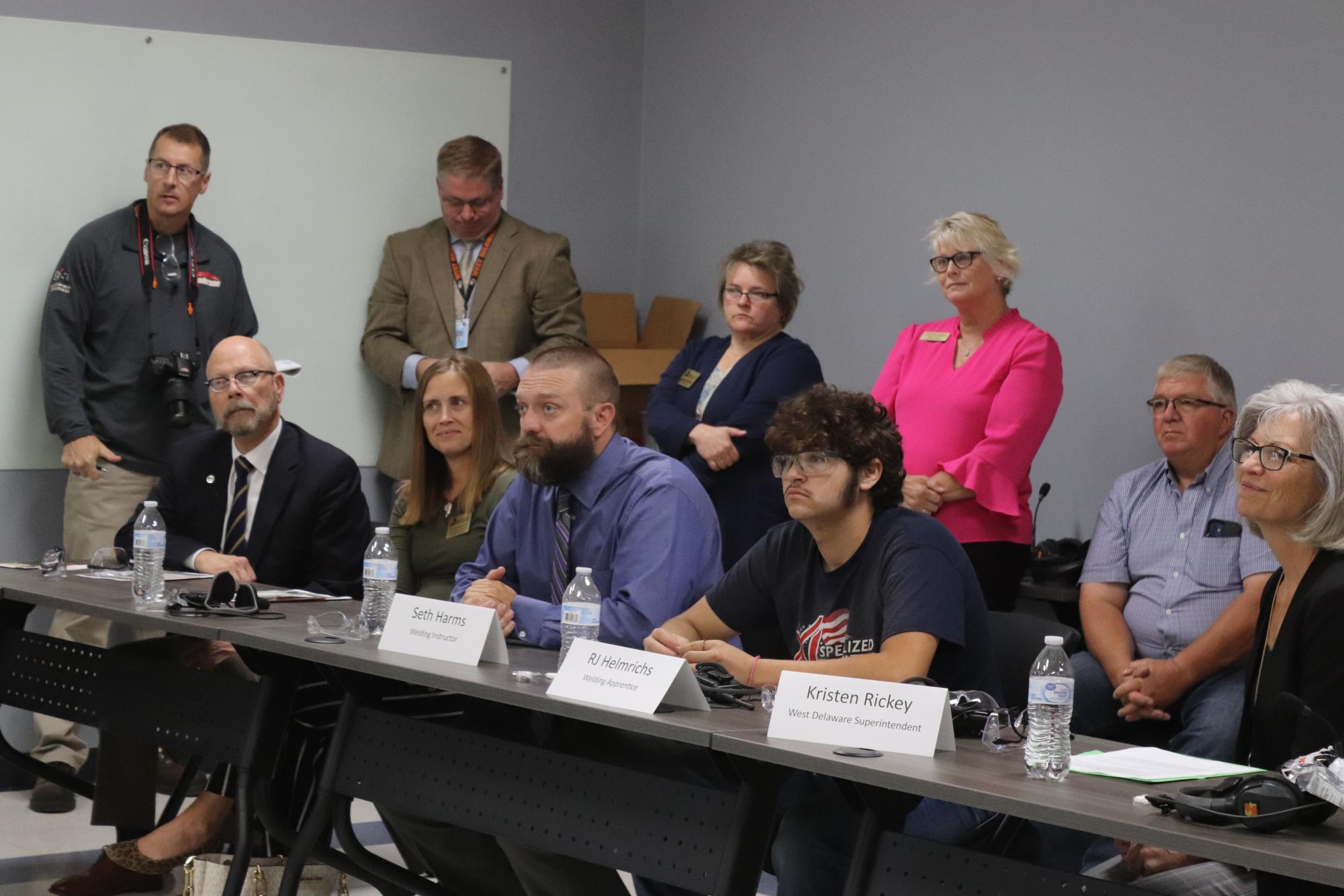 As a member of the panel, senior welding apprentice R.J. Helmrichs answers a question at the Work-based Learning Tour held at Henderson Products on Monday, Sept. 11.