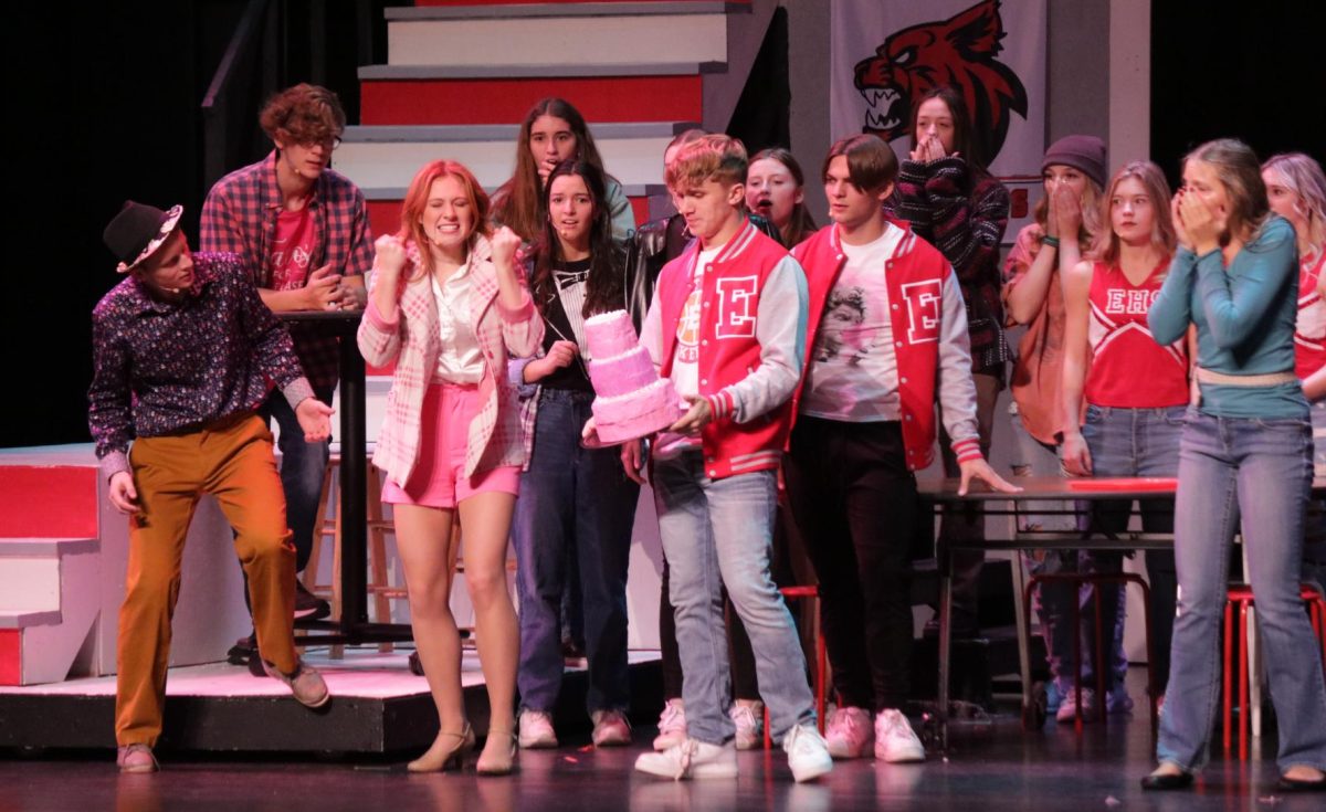 During a rehearsal, the actors react to Zeke, played by Michael Kephart, smash a cake in Sharpays face. Senior Liz Sleper played Sharpay.