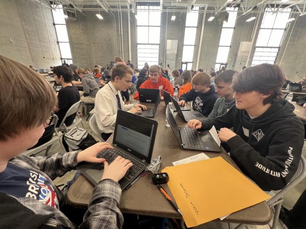 Students participate in the cyber security contest held during the LooCon March 7. This team placed third in the competition. 