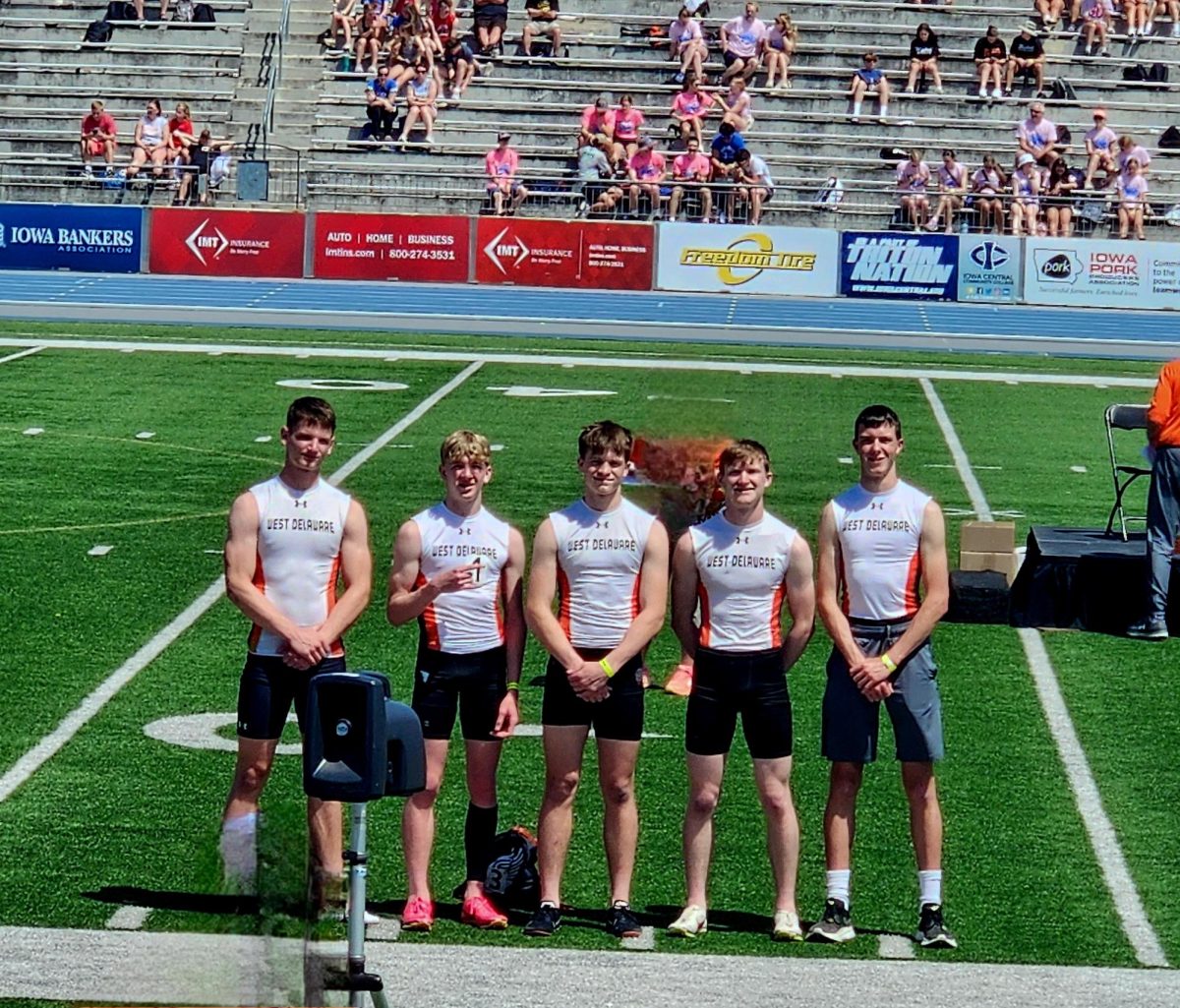 Seth Jackson (11), Clark Morris (11), Levi Wilson-Bries (11), Christian Timmerman (11), and Nick Mensen (12) participate in state track.