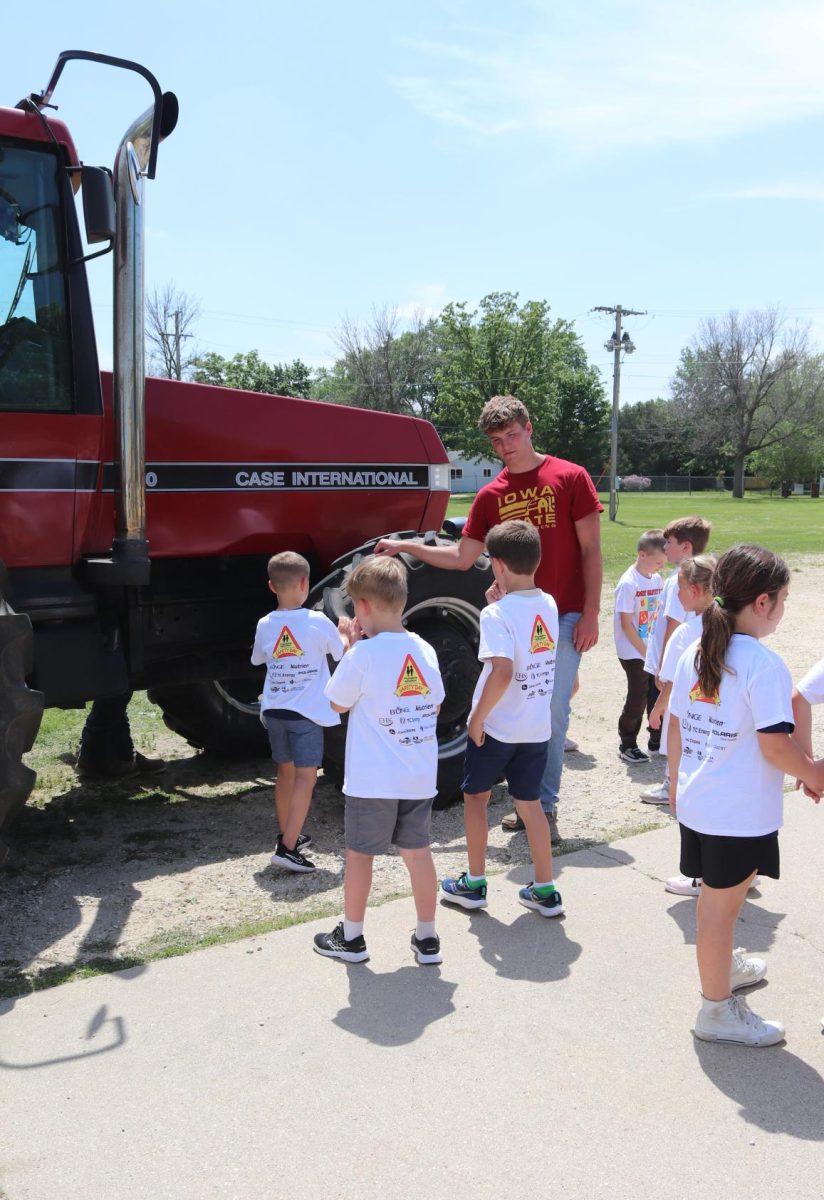 Working the farm machinery rotation, senior Jack Smith teaches the students about the dangers of being around tractors. 
