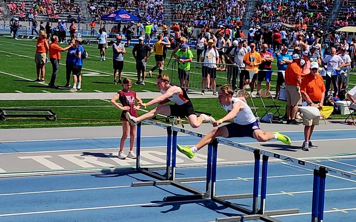 Christian Timmerman (11) ran for the shuttle hurdle.