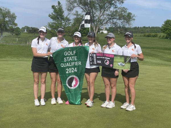 The Girls golf team poses with their state qualifier banner. Left to right: Andrea Wubbena, Susie Funke, Emma Hogan, Maylin Coates, Rayleigh Heims, Malorie Putz.