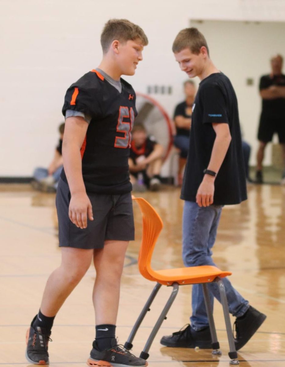 During Homecoming Olympics, sophomores Jay Georgen and Braden Eschen battle it out in musical chairs. Georgen was victorious, scoring a point for the sophomore team. 