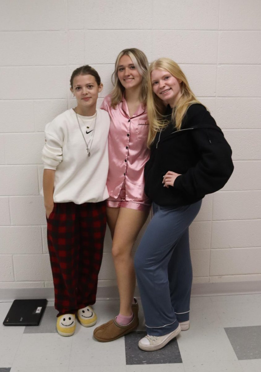 During PJ day on Monday of Homecoming Week, seniors Lili Shappell, Aubrey Wilson, and Ali Robinson pose in their comfy outfits. Monday PJ Day is a staple at the high school. 