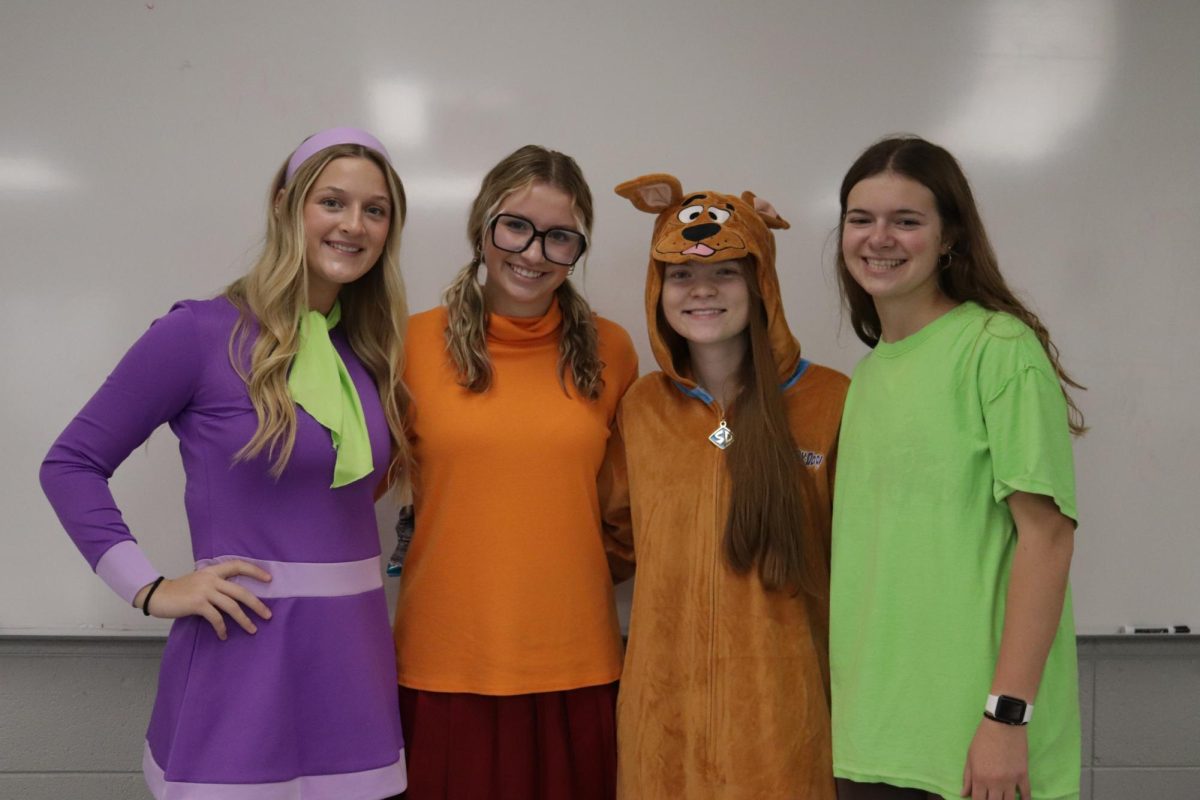 The Scooby-Doo group, Susie Funke, Josie McMahon, Olivia Halverson, and Kennedy Kolbet, were awarded Best Halloween Costume in the senior category.