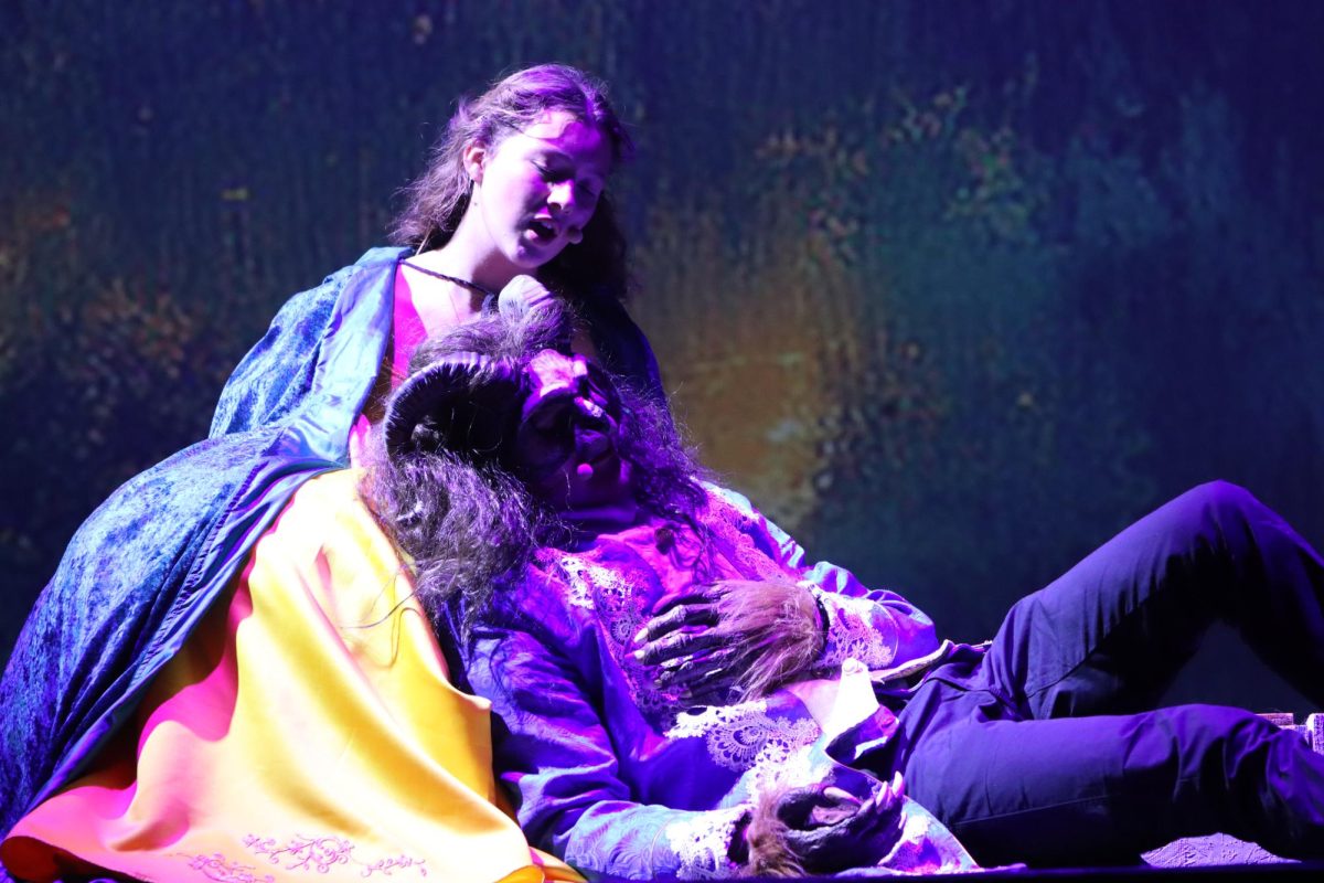 Grace Sleper as Belle and Christian Timmerman as the Beast perform a heartfelt scene from the upcoming musical 'Beauty and the Beast'. 