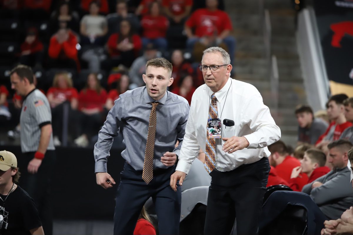 First-year head coach Jake Voss and assistant coach Jeff Voss lead the West Delaware wrestling team to a second-place finish at the Dual Team State Championships. 
Photo contributed by Lisa Yonkovic.