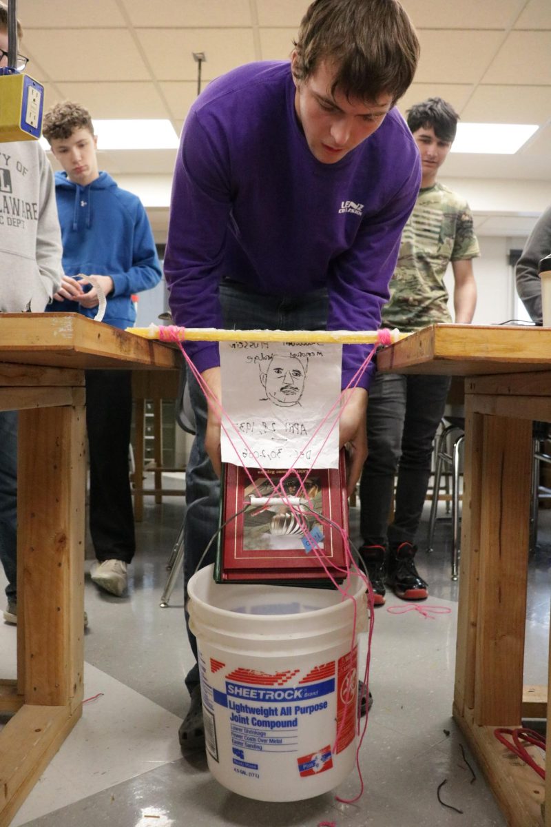 In Exploring Technology, senior Wes Devaney wins the strongest bridge contest with the best ratio of books to linguine noodles. "I used a ton of glue," Devaney said. "So the noodles held up pretty well."