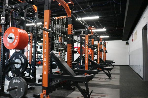 Students utilize the new weight room before and after school while Matt Seabold supervises.