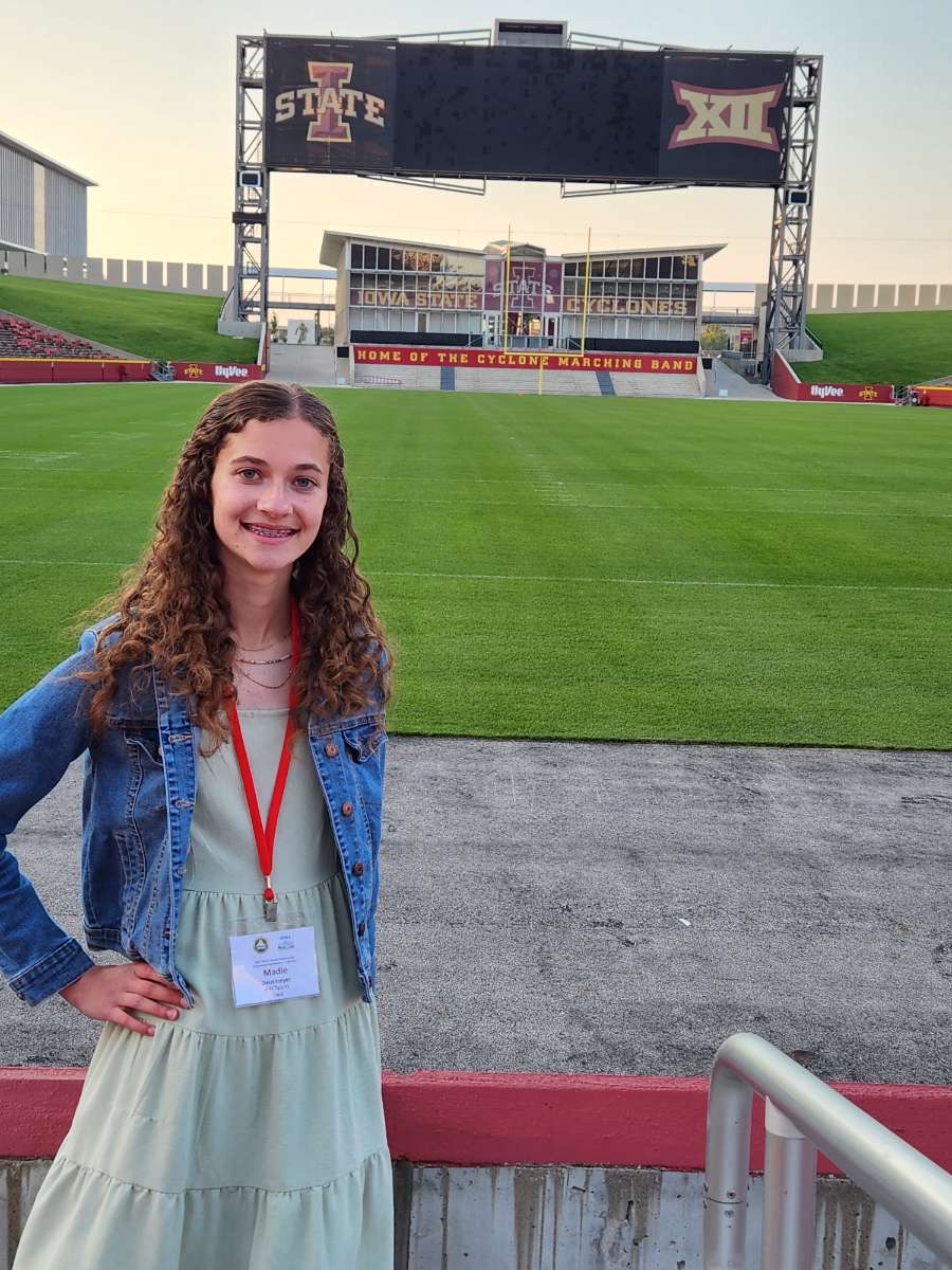 Madi Deutmeyer (11) played percussion at the National Association of County Agricultural Agents (NACAA) conference at Jack Trice Stadium. (Photo contributed by Pam Deutmeyer.)