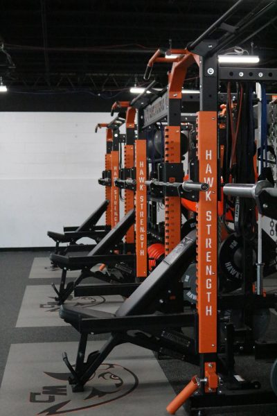 The upgraded weightroom contains new racks, weights, and other equipment.