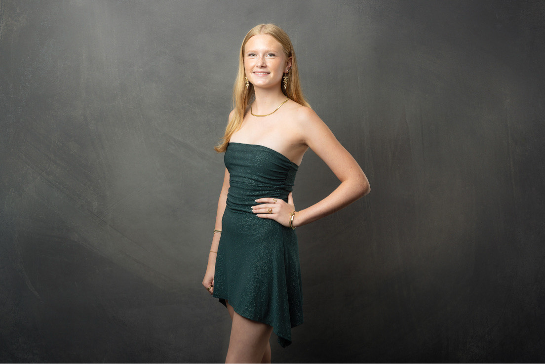 Ella-Marie Bischof (11) poses for a picture before the Homecoming Dance.
(Photograph by Lori Kartman)