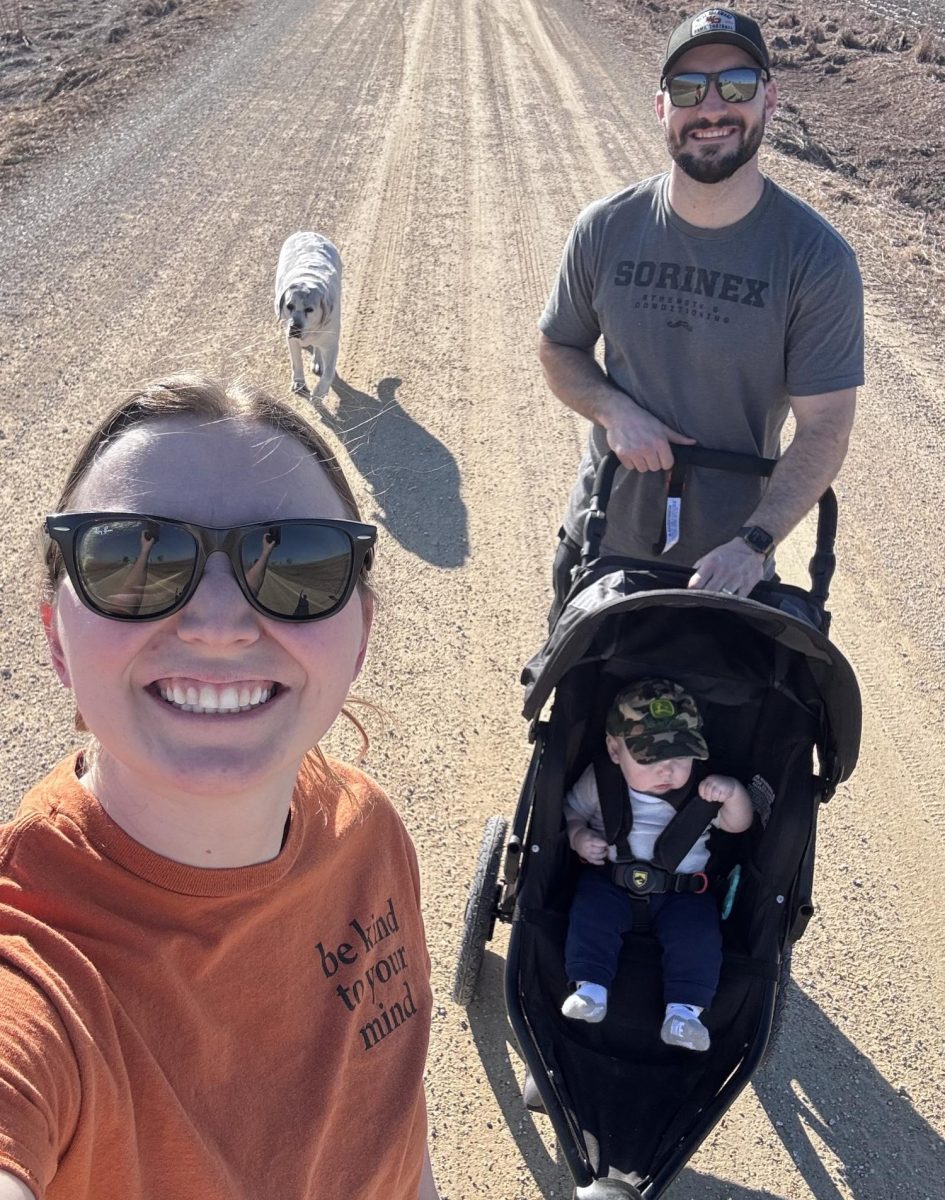 After school, Jennie Seabold walks with her husband Matt Seabold and their son Milo.