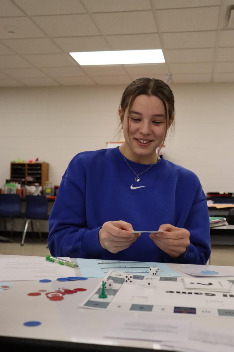 Reading off of a card, Kaci Reth (10) participates in the Cell Cycle Game.