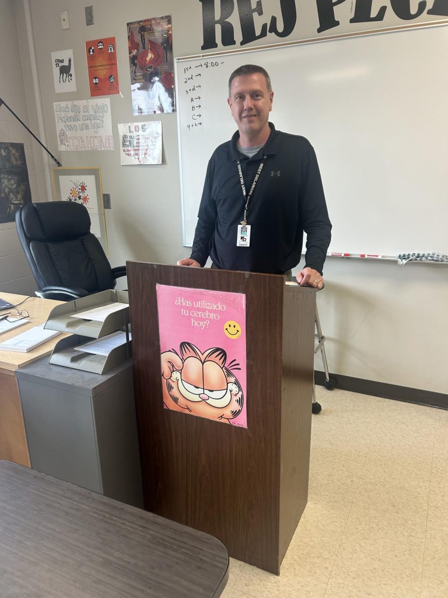 Teacher Dale Sperfslage prepares to teach Spanish class.