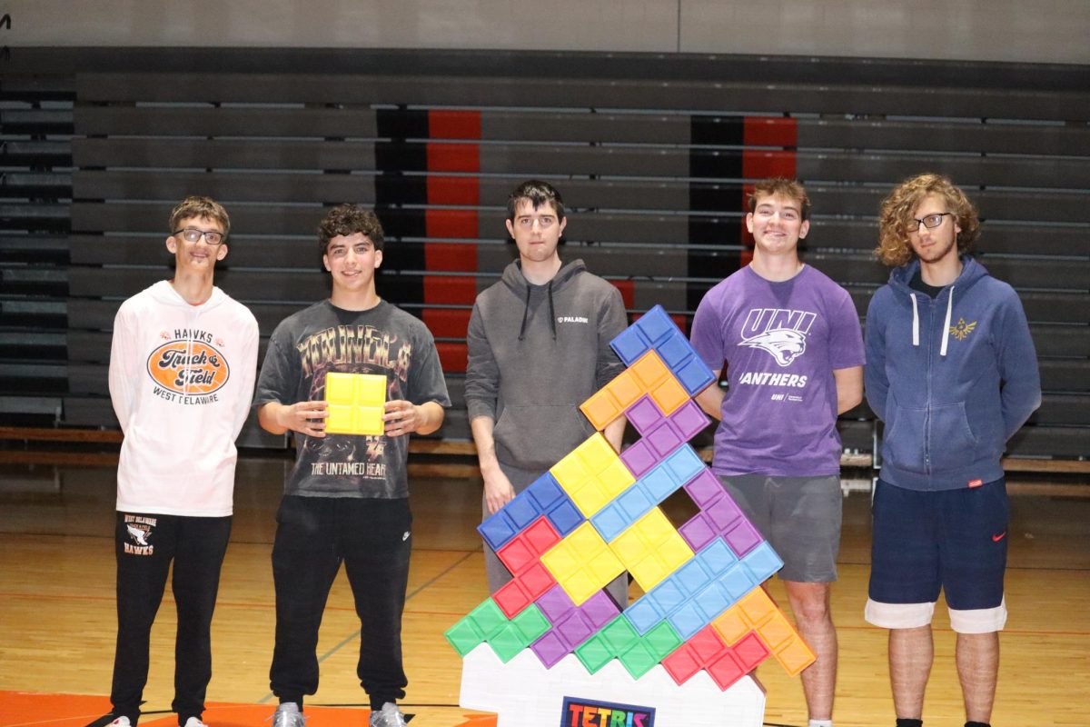 After winning the bracket, seniors Kyler Wooten, Travyn Sullivan, Charles Weber, Ethan Timmerman, and Jaxson Weber stand behind the Tetris Tumble.