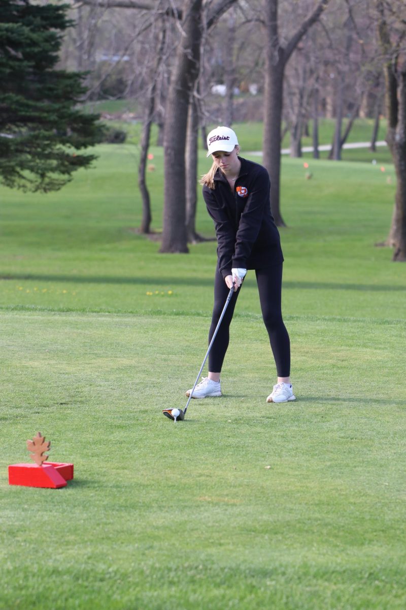 Isabella Barrett (12) drives her ball.